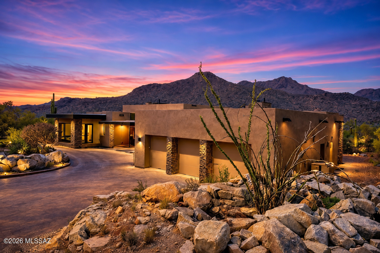 Saguaro Ranch residence exterior at desert sunset